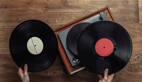 how do vinyl records play music and what makes them unique in the digital age